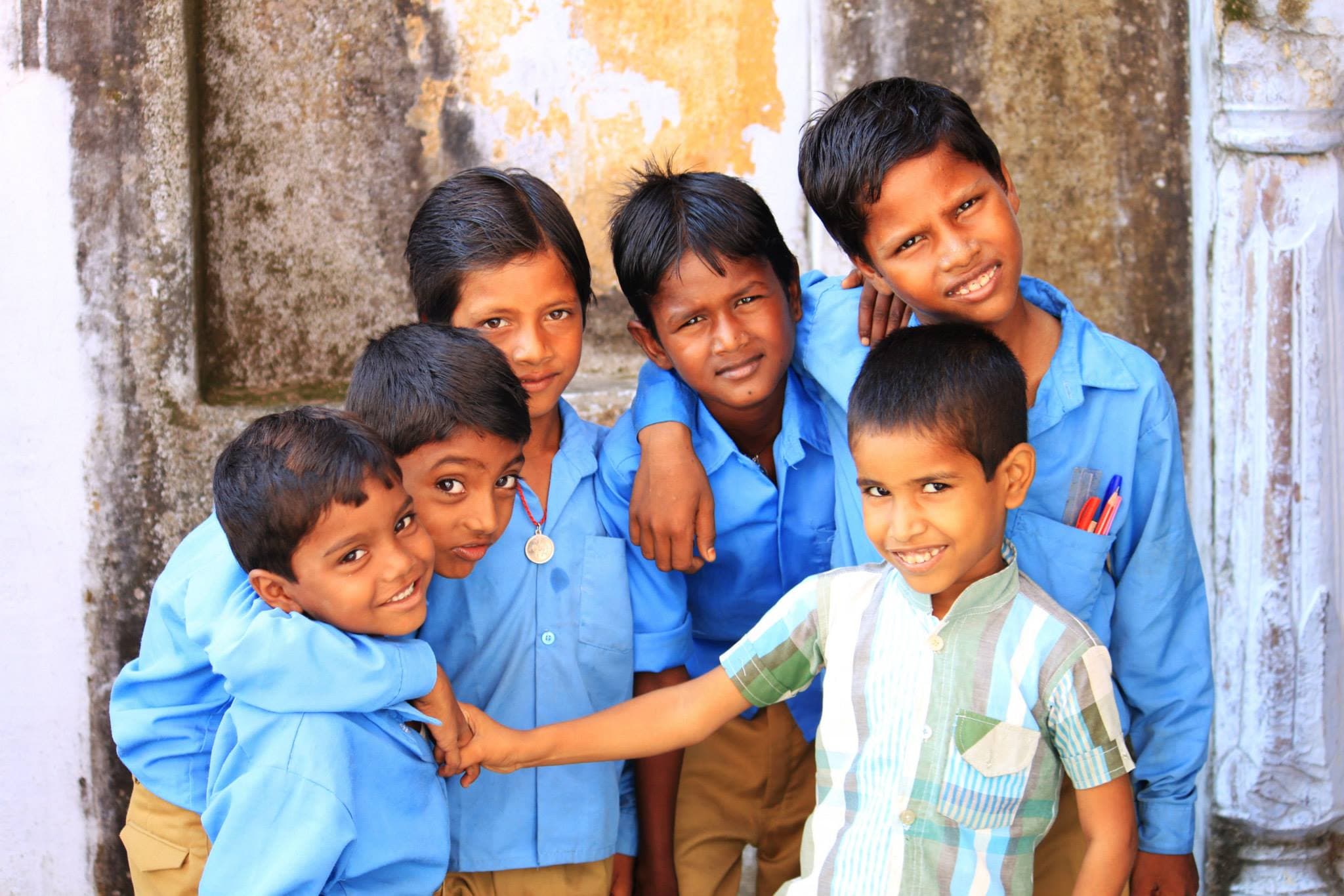 A group of children standing together in Tordi Garh, photographed during the India trip