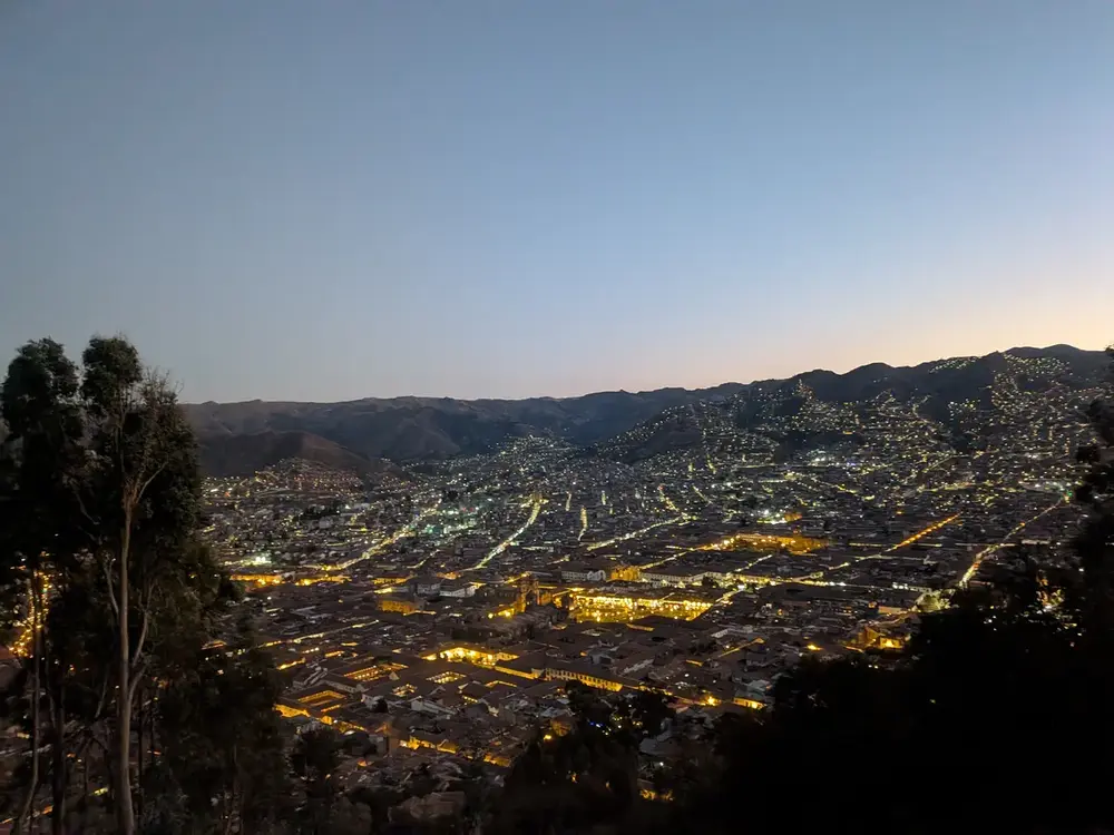 Cusco illuminated at dusk, photographed on the traveller’s Peru Trip
